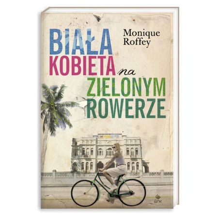 Biała kobieta na zielonym rowerze