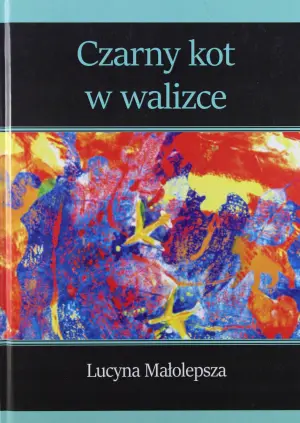 Czarny kot w walizce