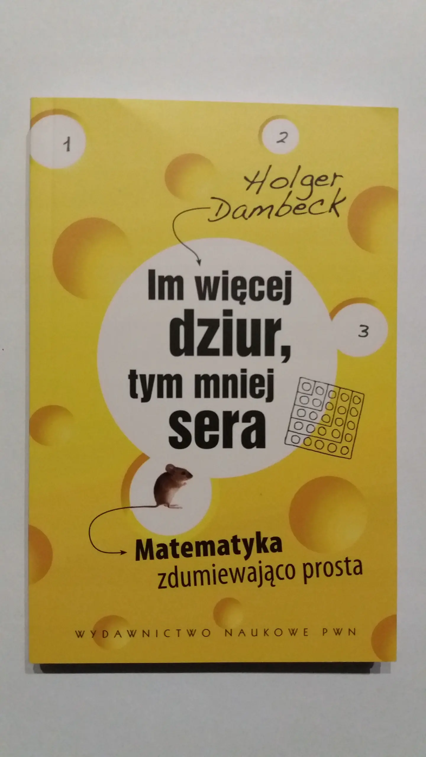 Książka - Im więcej dziur, tym mniej sera