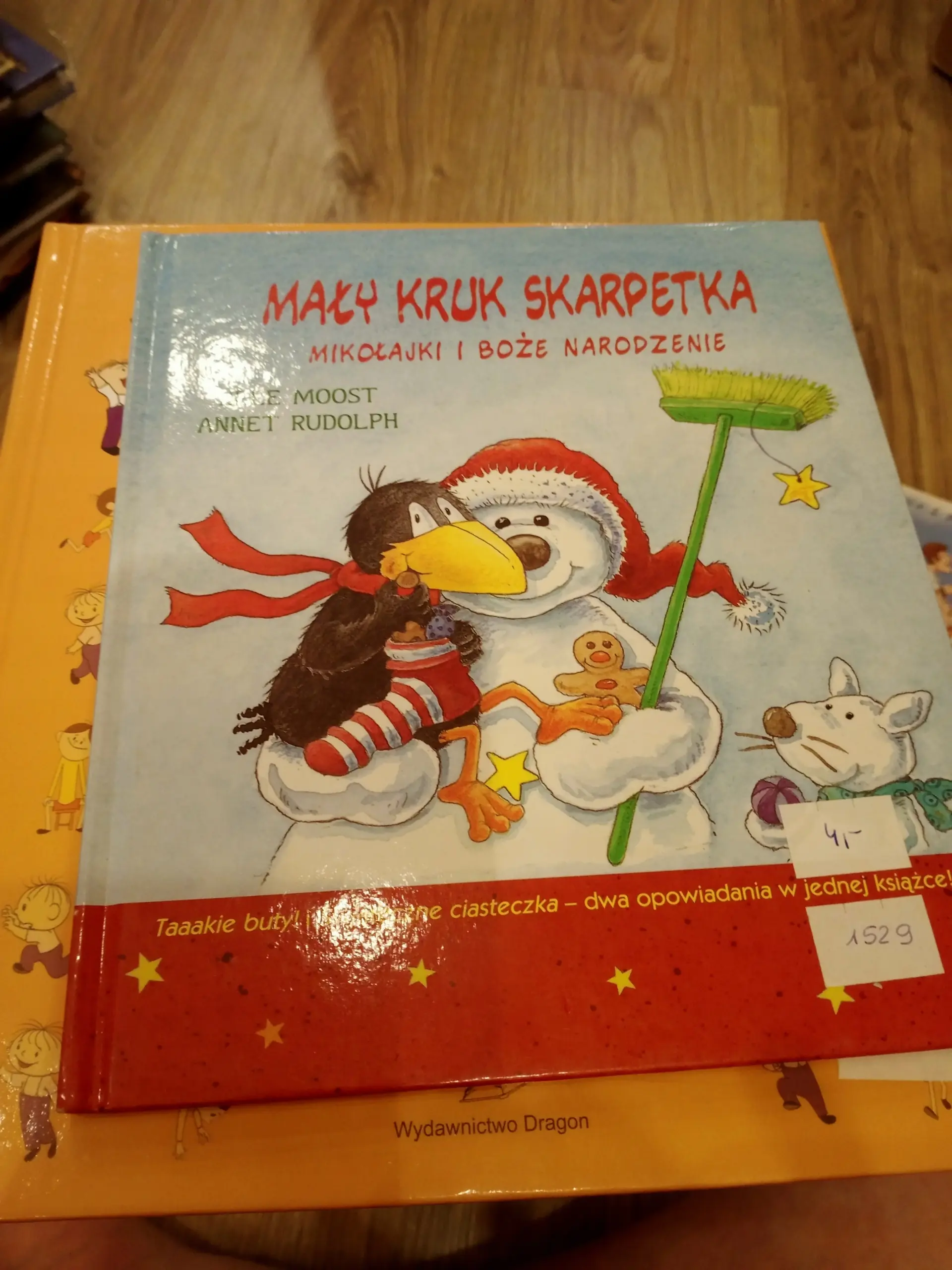 Książka - Mały Kruk Skarpetka. Mikołajki i Boże Narodzenie