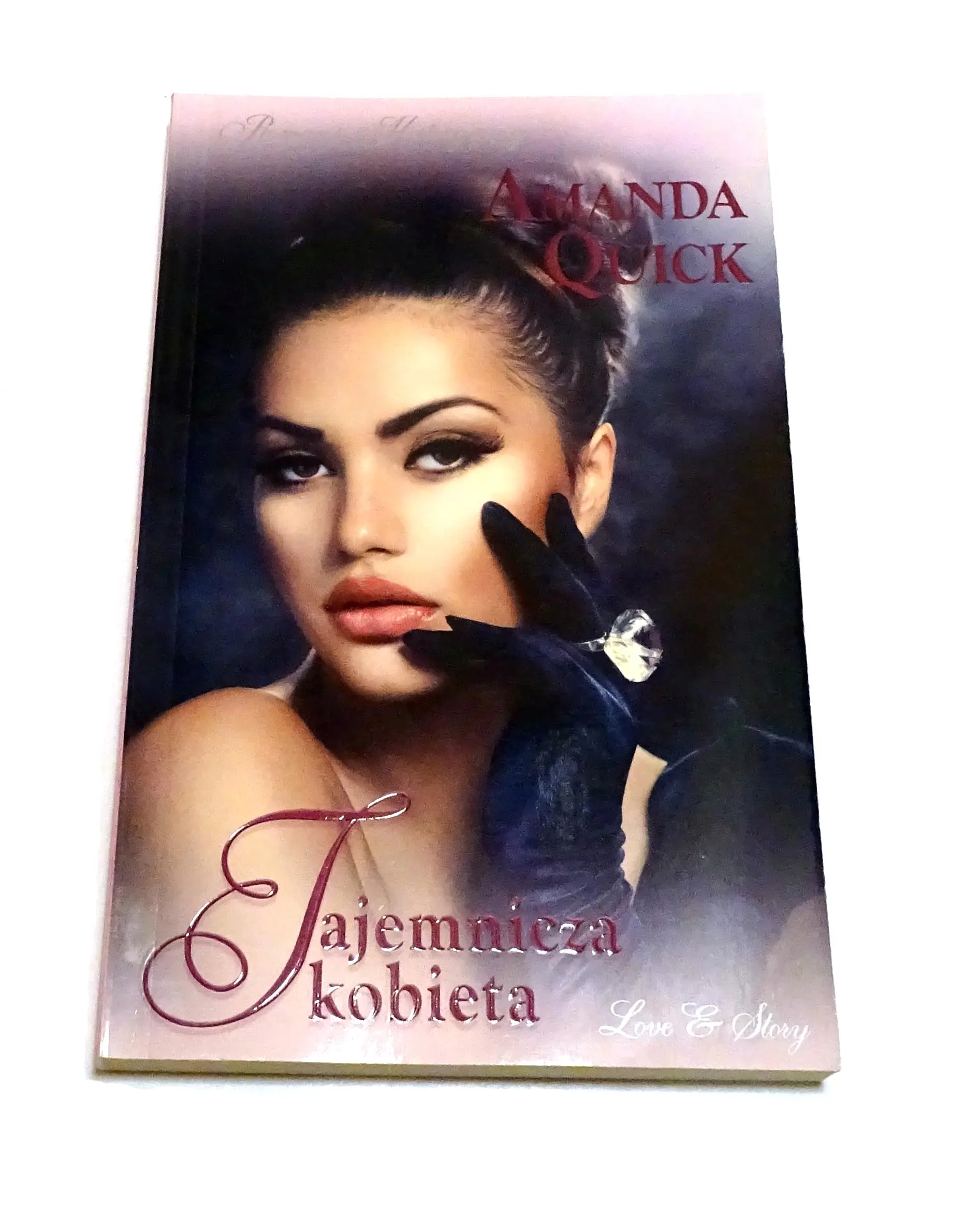 Książka - Tajemnicza kobieta 