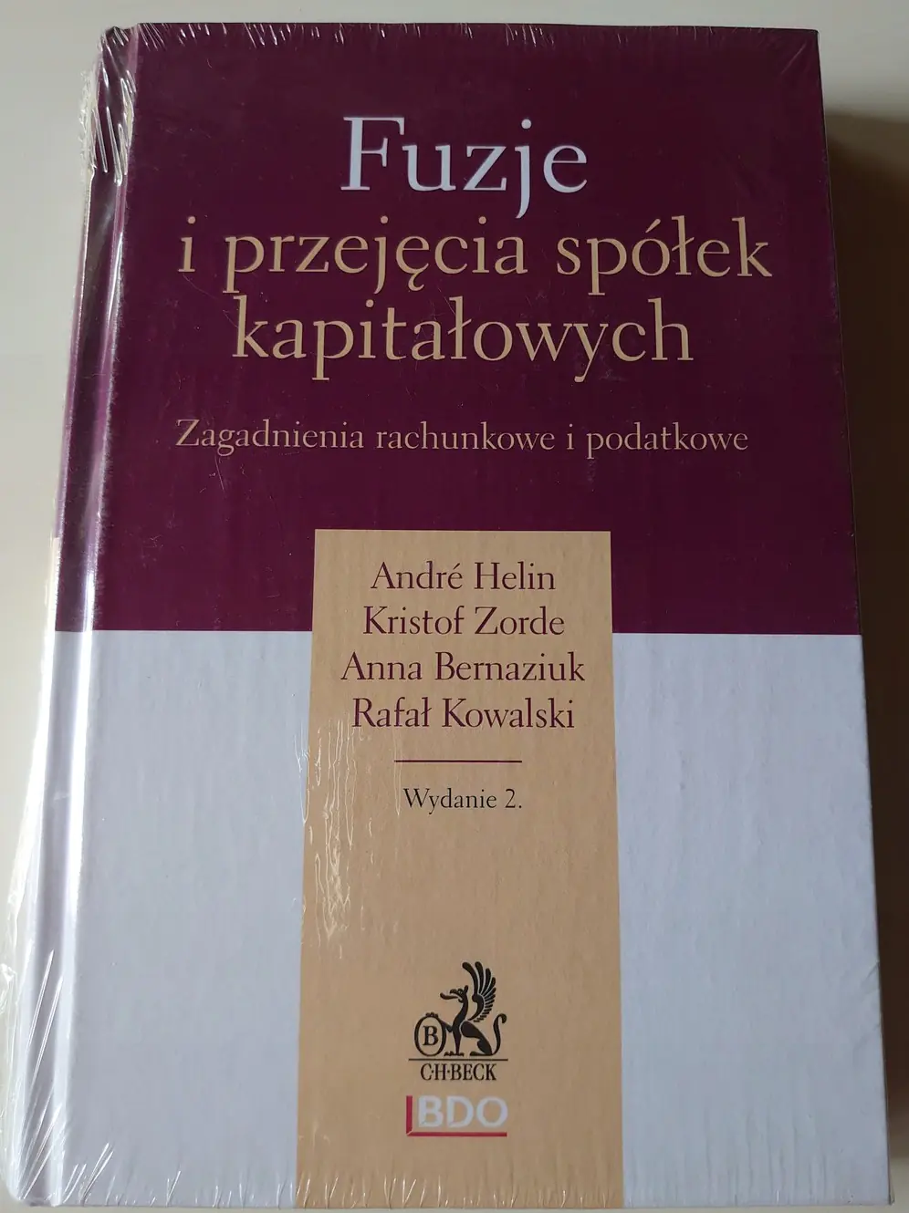 Książka - FUZJE I PRZEJĘCIA SPÓŁEK KAPITAŁOWYCH ZAGADNIENIA RACHUNKOWE I PODATKOWE WYD.2