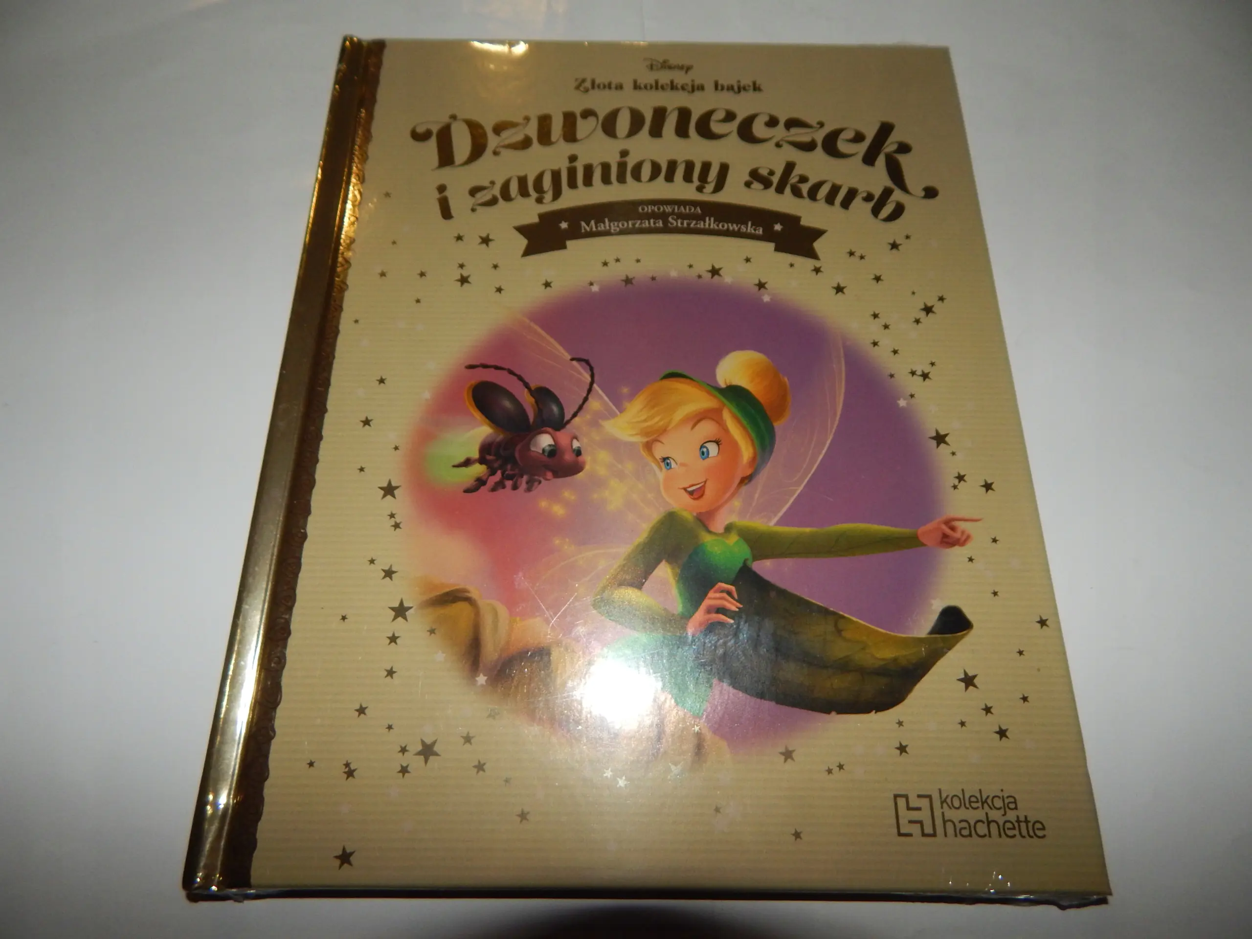 Książka - Dzwoneczek i zaginiony skarb. Disney Złota Kolekcja Bajek. Tom 57