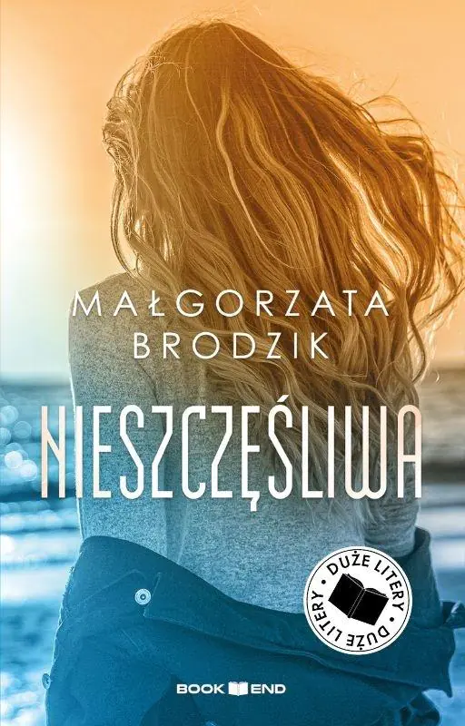 Książka - Nieszczęśliwa. Duże Litery