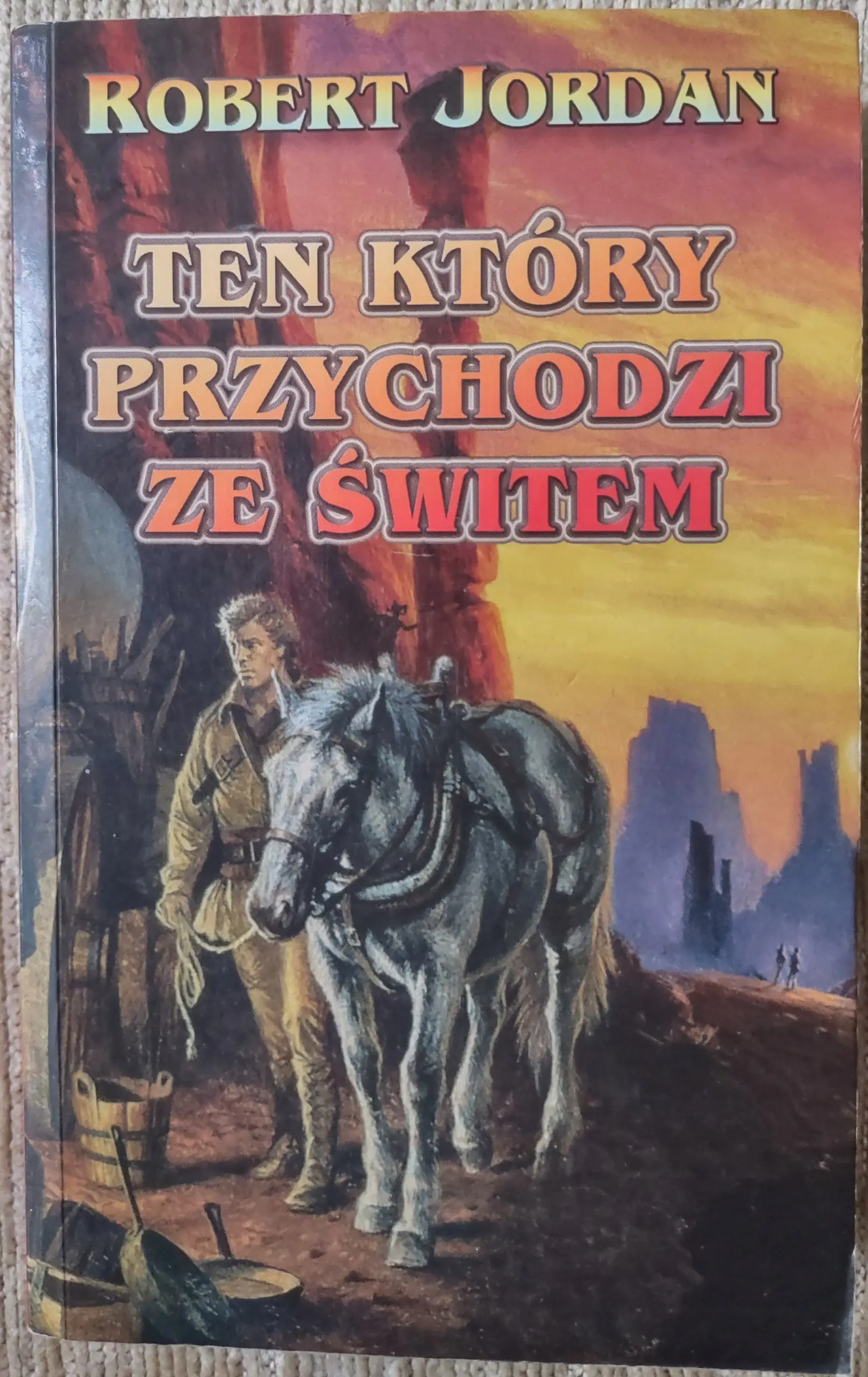 Książka - Ten, Który Przychodzi ze Świtem