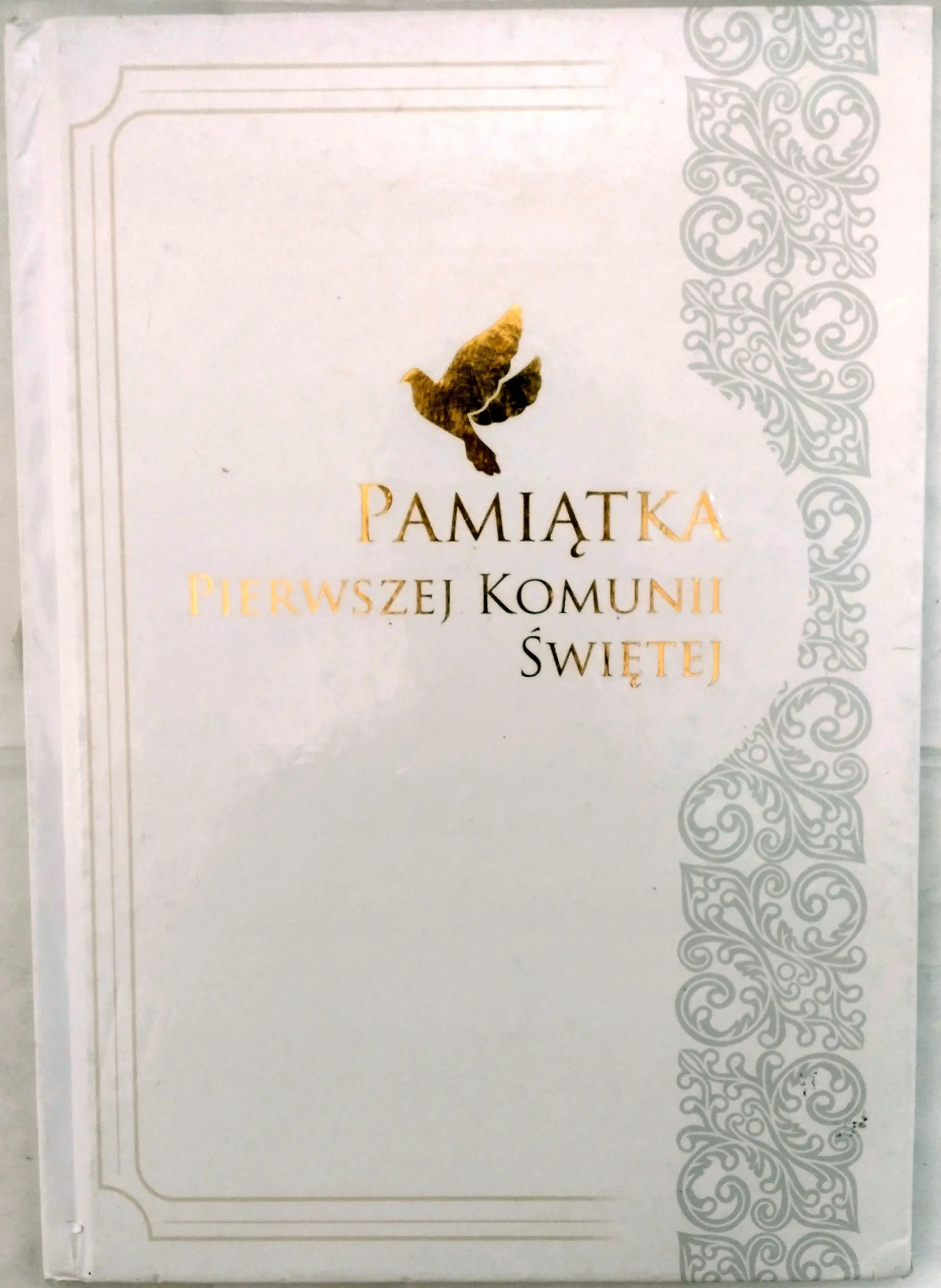 Książka - Pamiątka pierwszej komunii świętej