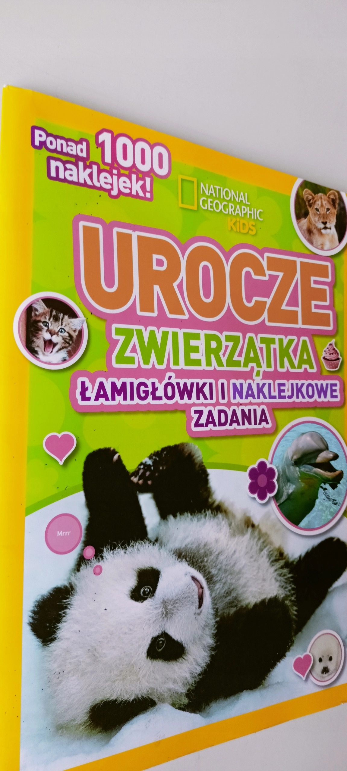 Książka - National Geographic Kids. Urocze zwierzątka. Łamigłówki i naklejkowe zadania
