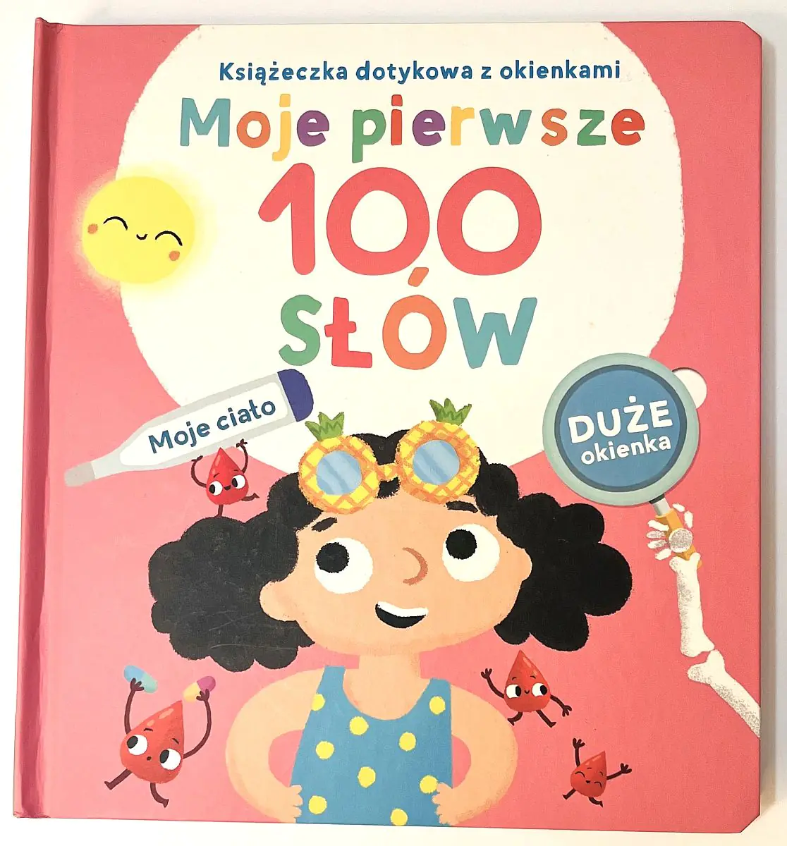 Książka - Książeczka dotykowa z okienkami. Moje pierwsze 100 słów. Ciało